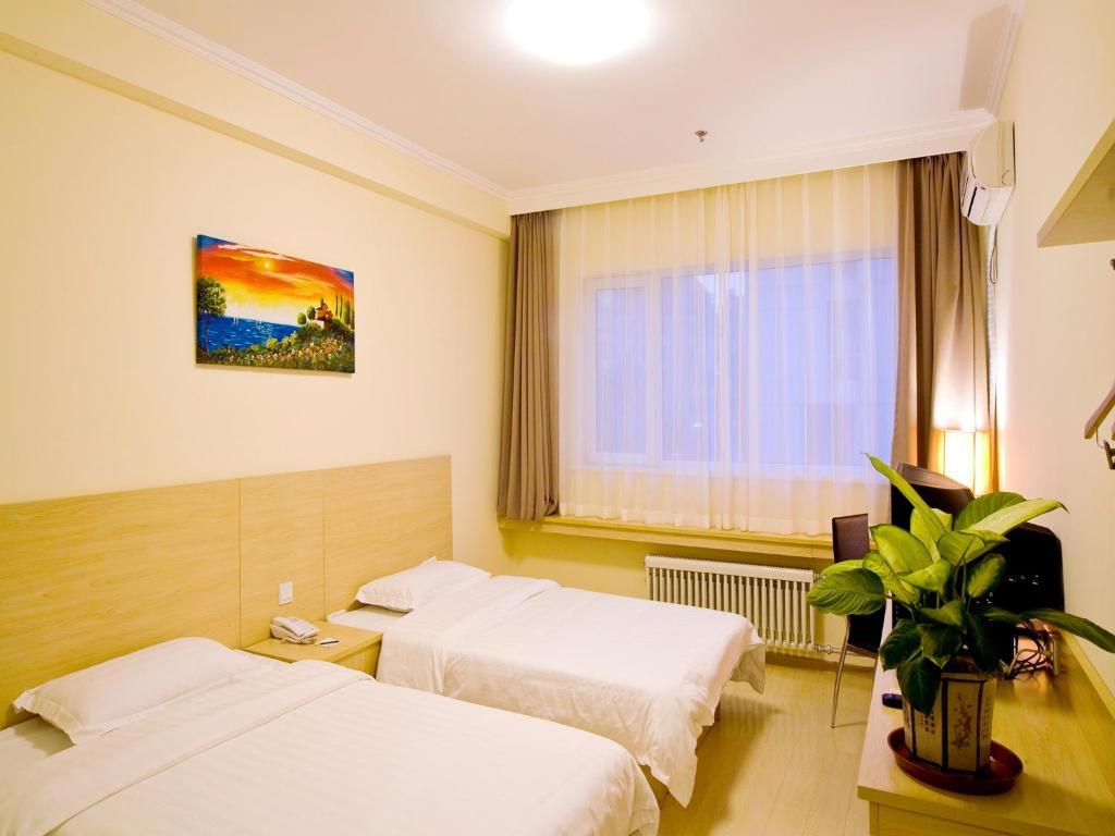 Haitian E Inn Qingdao Habitación foto
